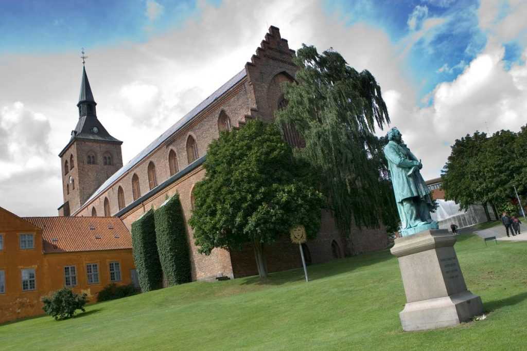 Odense Cathedral and the Hans Christian Andersen sculpture.